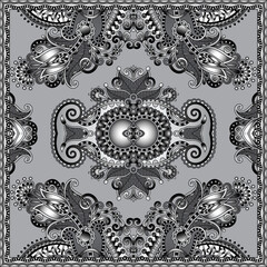 Black and white paisley floral pattern on grey background
