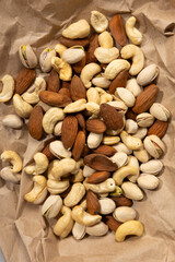 Nuts assortment on craft paper top view