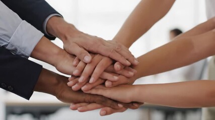 Diverse Hands in Unity for Common Goals - A group of diverse people are shown with their hands stacked on top of each other. - Powered by Adobe