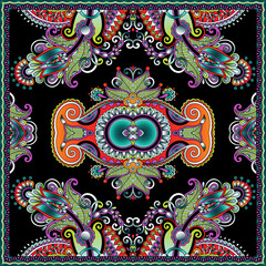 Colorful paisley floral pattern on black background