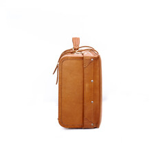 Vintage style tan leather suitcase isolated on white background, perfect for leather industry catalog design