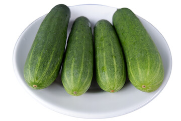 Cucumber are displayed on plate with calm and simple presentation, showcasing natural vibrant green color and fresh texture, delicious