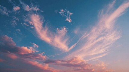 Beautiful Sunset Sky with Wispy Clouds and Vibrant Colors at Dusk