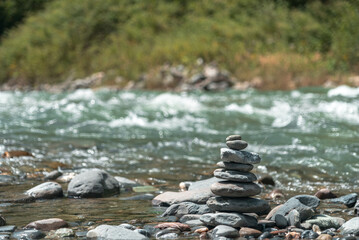 ​​Mountain Stream with Crystal Clear Water Flowing Through Natural Stone Arrangements in Serene Mountain Forest​