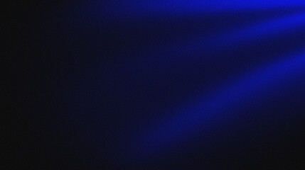 Abstract dark blue background with light rays.