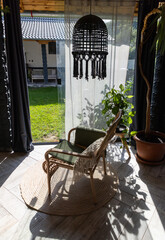 rustic greenhouse living room with tropical foliage for concepts of comfort  serenity and eco-friendly interior