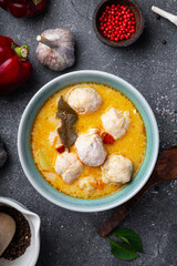 Soup with meatballs, potatoes and cheese vertical photo. Meatballs in thick vegetable soup Albondigas. Mexican and Spanish, European and Russian cuisine