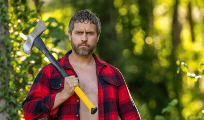 Man in forest with axe. Lumberjack carries axe. Deforestation. Mature sweating man with axe. Lumberjack in woods with ax. Lumberjack tired with heavy axe. Strong man work in forest, advertisement