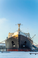 Naklejka premium The first nuclear icebreaker Lenin at its permanent mooring in the Murmansk port.
