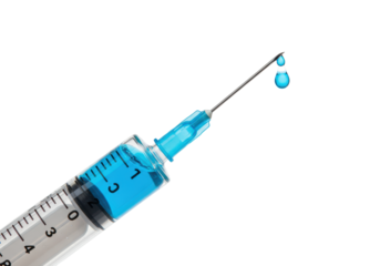 Isolated syringe with blue liquid and two drops hanging from needle with medicine
