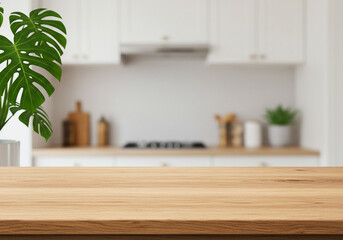 Clean modern kitchen counter with tropical monstera plant providing fresh natural backdrop for product placement and culinary inspiration