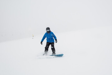 young woman with snowboard