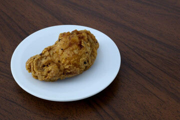 Fried chicken wings on a white plate