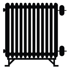A black radiator with multiple vertical segments is placed upon supports showing heat efficiency