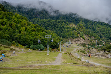 Cable cars in mountain valley Qabala