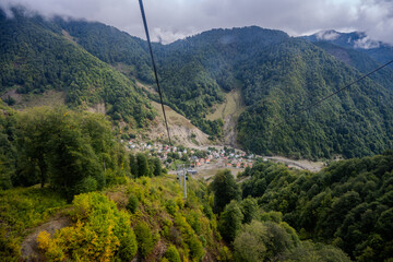 Cable car view over mountain village Qabala