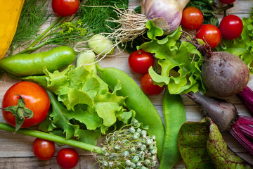 Autumn fresh vegetables on wooden table background