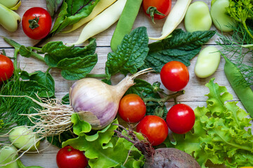 Autumn fresh vegetables on wooden table background