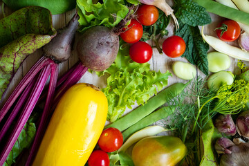 Autumn fresh vegetables on wooden table background
