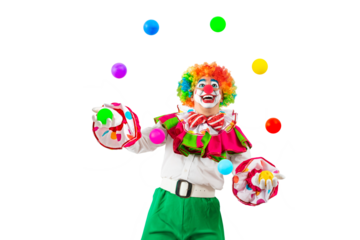 Funny juggler clown juggling balls in the circus, man entertainer as Joker in a suit and wig, with clown whiteface makeup. Trickster, jester, pantomime, mime, and a professional actor at events