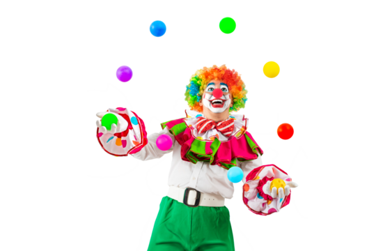 Funny juggler clown juggling balls in the circus, man entertainer as Joker in a suit and wig, with clown whiteface makeup. Trickster, jester, pantomime, mime, and a professional actor at events