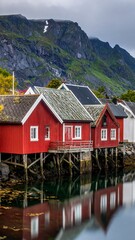 Colorful waterfront houses nestled by a mountain
