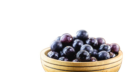 Jaboticaba or jabuticaba is a purplish black-white fruit that can be eaten raw or used to make jams, juices, liqueur or wine. Typical Brazil fruit on white isolated background.