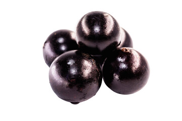 Jaboticaba or jabuticaba is a purplish black-white fruit that can be eaten raw or used to make jams, juices, liqueur or wine. Typical Brazil fruit on white isolated background.