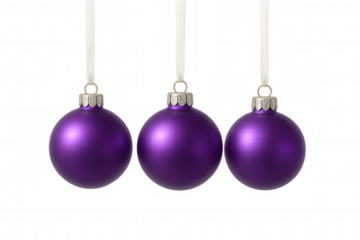 Three purple matte christmas ornaments hanging on white ribbon, festive holiday decoration with transparent background