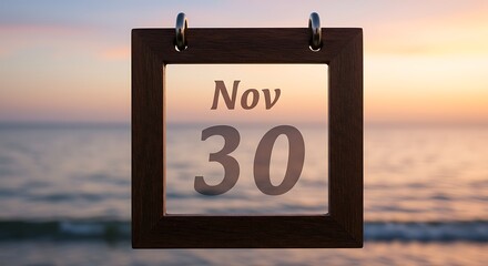 November 30 calendar displayed against ocean and sunset background