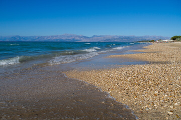 Beach on the island of Korfu - a great place with a calm ocean and a rocky shore