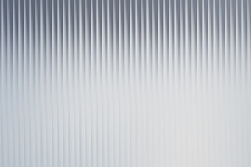 Obraz premium Vertical stripes pattern with light gradient in shades of white and gray creating a textured surface
