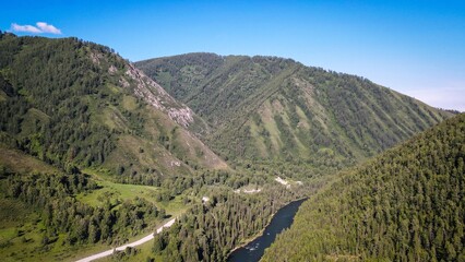 Aerial landscape of taiga forest and mountains, Altai, Russia