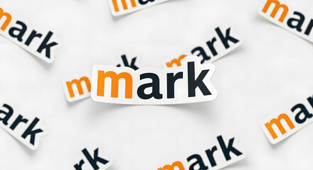 Sticker with the word mark over a white background, mark typography, paper sticker