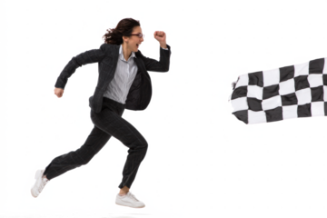 Businesswoman running towards a checkered flag, symbolizing success.