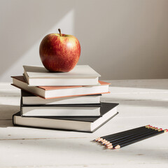 Apple on Stack of Books
