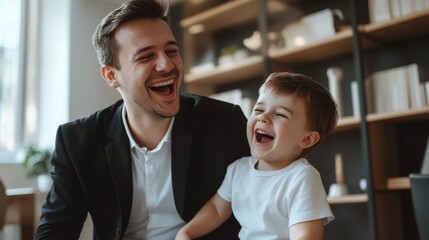 Joyful young father in business jacket enjoys playtime with son in office after work