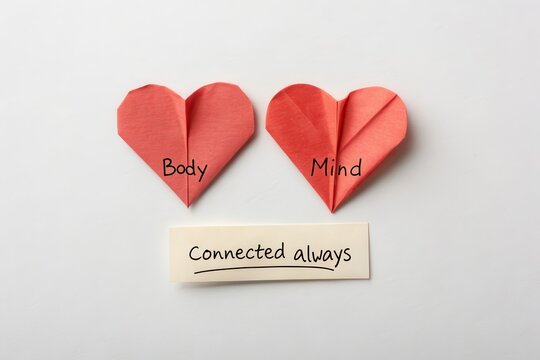 Paper hearts representing body mind and connection always