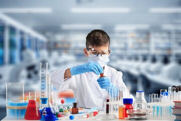 Little child make chemistry science experimental chemistry lessons.