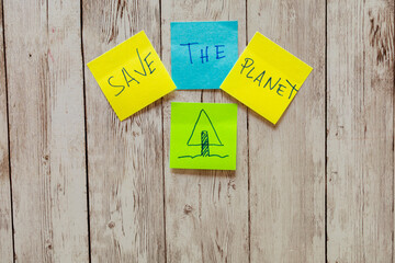 Sticky notes displaying save the planet message