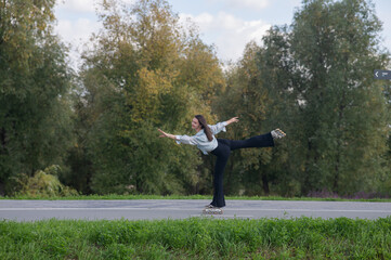 Caucasian woman roller skating in park. 