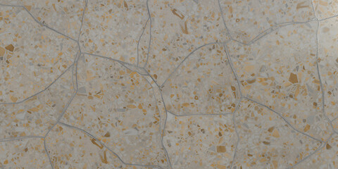 Beige terrazzo flooring with cracks, a classic and durable choice for interior design, showcasing a timeless aesthetic with a touch of imperfection