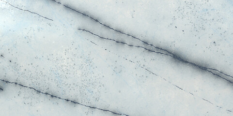 Elegant white marble texture with subtle gray veins, creating a sophisticated and timeless surface for interior design and architectural applications