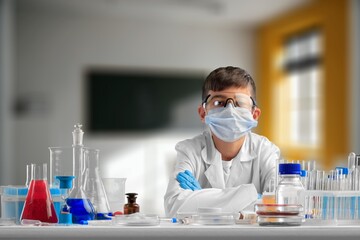 Little child make chemistry science experimental chemistry lessons.