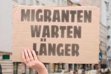 “Migranten Warten Länger” Migrants face longer waits and slower paths to inclusion. MIGRANTS....