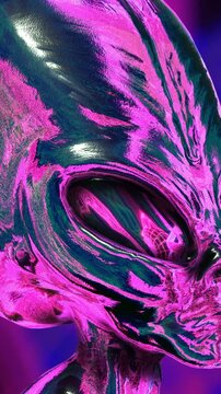 Seamless vertical video loopable animation of a metal alien head spinning