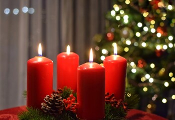 Four Advent candles are burning.  Christmas decor.Christmas in Sweden.