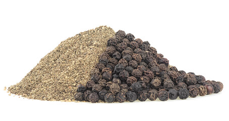 Minced black pepper and grains isolated on a white background. Ground peppercorn pile. Black pepper powder.