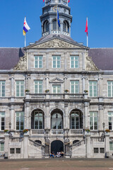 Front facade of the historic town hall on the market square in Maastricht, Netherlands
