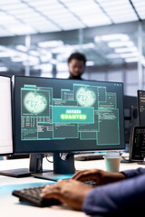 Close up of access granted notification on screen received by developer reconfiguring server hub, optimizing it. Data center IT expert using PC to successfully eliminate all errors